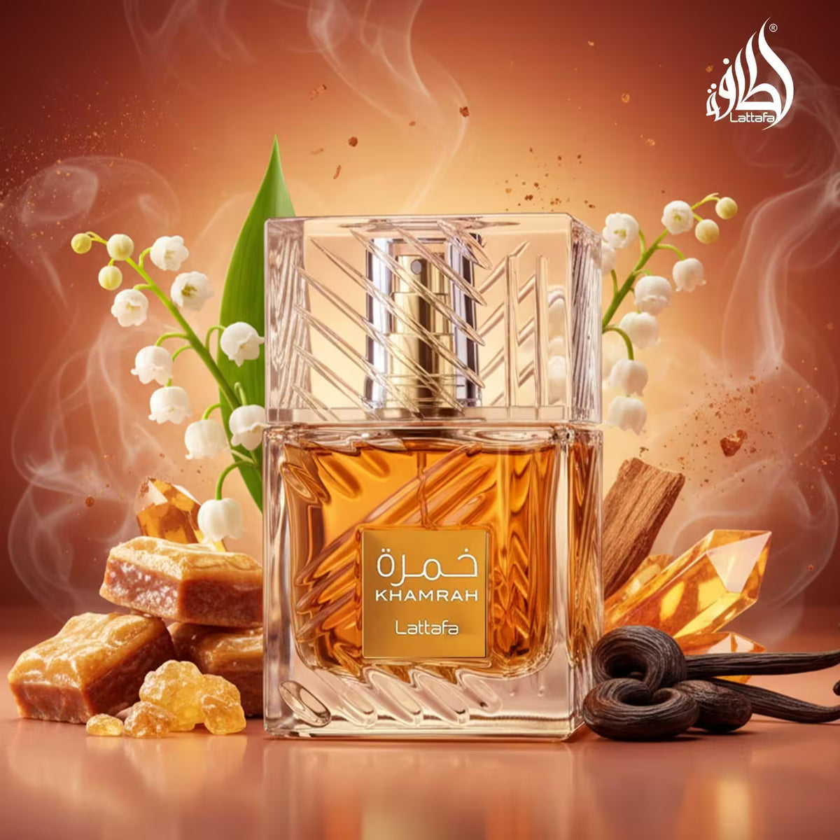 Khamrah perfume bottle by Lattafa with vanilla beans and flowers on a warm background