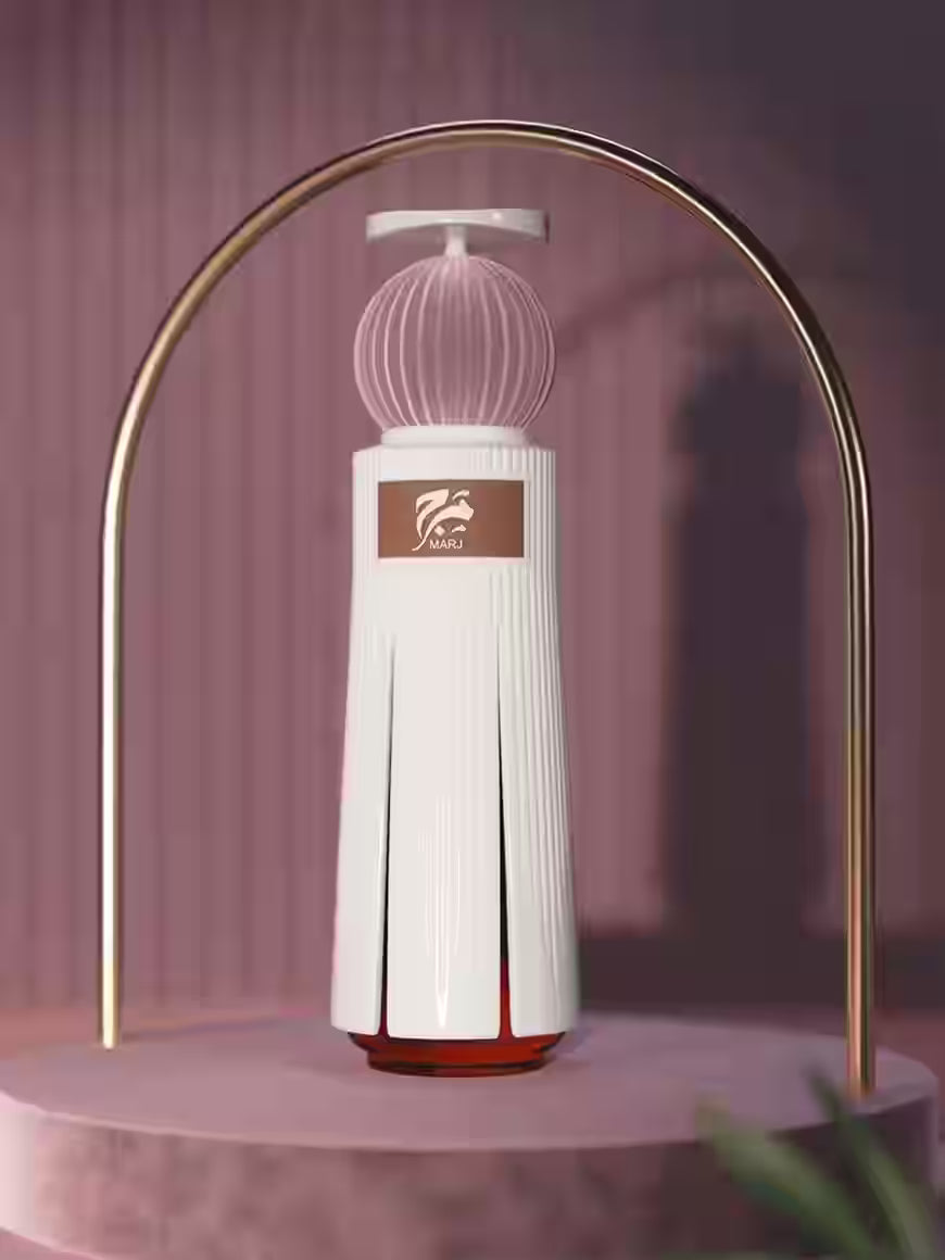 A modern cylindrical perfume bottle with a ribbed white body, a pink ribbed spherical cap, and a gold logo plaque, displayed on a pink pedestal under a gold arch.
