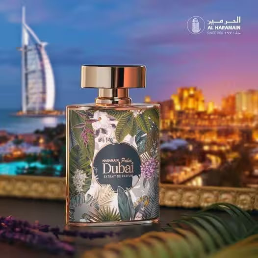 Perfume bottle with botanical design against a cityscape backdrop featuring the Burj Al Arab.