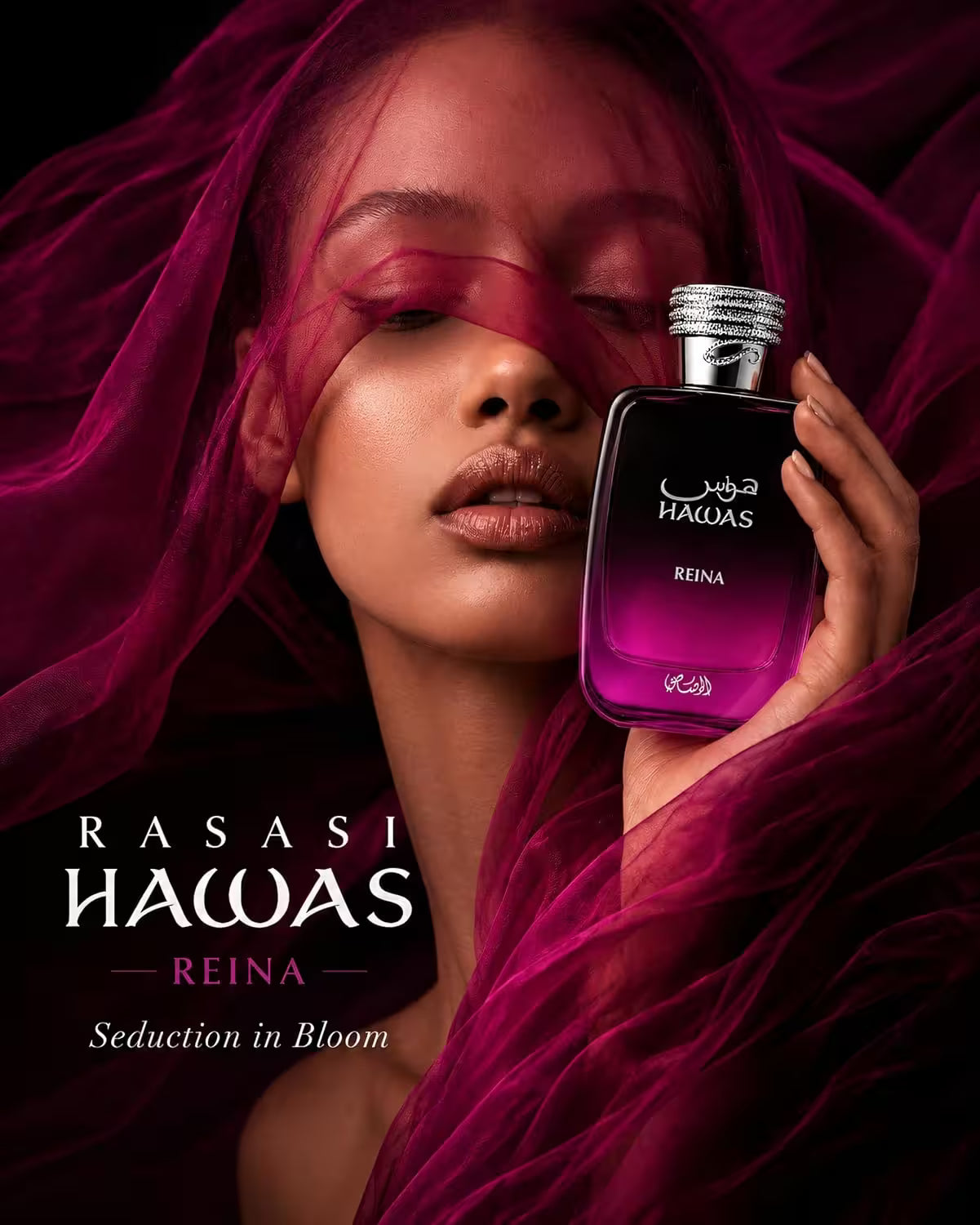 A perfume bottle labeled RASASI HAQAS REINA is held by a woman wrapped in flowing magenta fabric against a dark background.